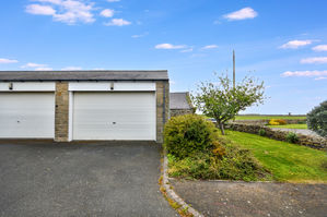 Garage and drive, with additional garden to the side- click for photo gallery